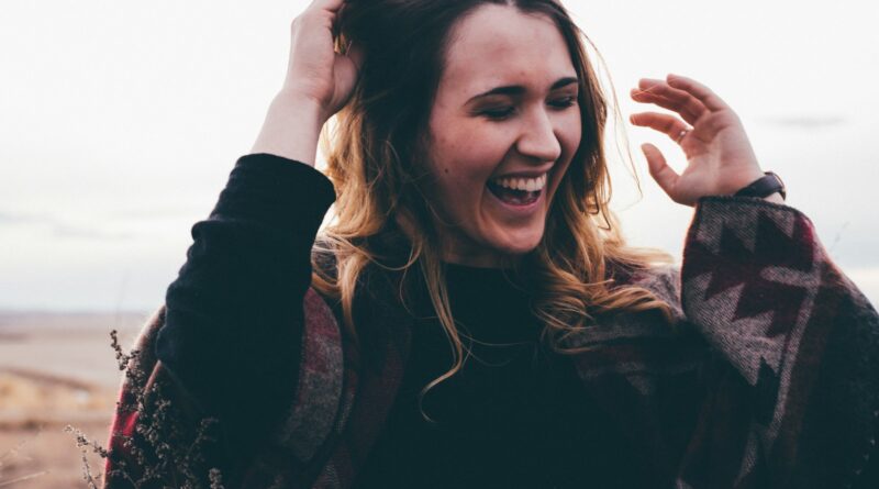candid photography of woman with broad smile